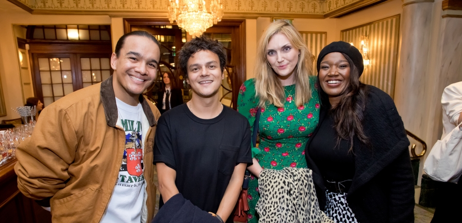 British musician Jamie Cullum and author Sophie Dahl, flanked by members of the Hamilton cast.