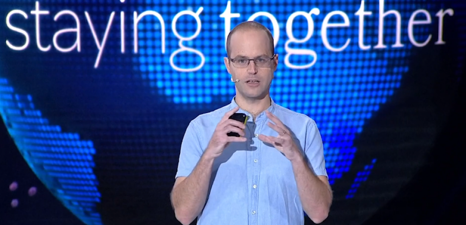 Dr. Nir London presenting at the International Board on his 'COVID Moonshot' drug discovery project