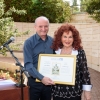 (L-R) Weizmann Institute President Prof. Daniel Zajfman presented Tova Leidesdorf with a scroll of appreciation at a ceremony on campus during the mission.