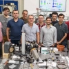 Prof. Victor Malka (fifth from left) in his lab with French colleagues