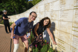 Celebrating Giving:  Marking new inscriptions on the International Plaza Donor Wall