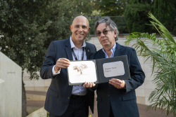 Celebrating Giving:  Marking new inscriptions on the International Plaza Donor Wall