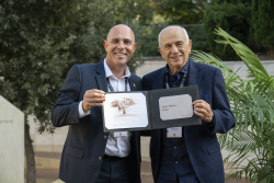 Celebrating Giving:  Marking new inscriptions on the International Plaza Donor Wall