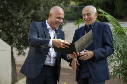 Celebrating Giving:  Marking new inscriptions on the International Plaza Donor Wall