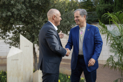 Celebrating Giving:  Marking new inscriptions on the International Plaza Donor Wall
