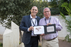 Celebrating Giving:  Marking new inscriptions on the International Plaza Donor Wall