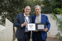 Celebrating Giving:  Marking new inscriptions on the International Plaza Donor Wall