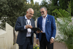 Celebrating Giving:  Marking new inscriptions on the International Plaza Donor Wall