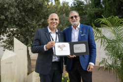Celebrating Giving:  Marking new inscriptions on the International Plaza Donor Wall