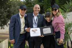 Celebrating Giving:  Marking new inscriptions on the International Plaza Donor Wall