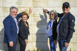 Celebrating Giving:  Marking new inscriptions on the International Plaza Donor Wall