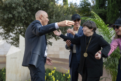 Celebrating Giving:  Marking new inscriptions on the International Plaza Donor Wall