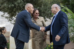 Celebrating Giving:  Marking new inscriptions on the International Plaza Donor Wall