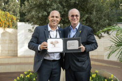 Celebrating Giving:  Marking new inscriptions on the International Plaza Donor Wall
