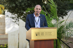 Celebrating Giving:  Marking new inscriptions on the International Plaza Donor Wall