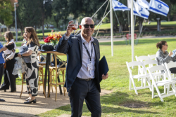Celebrating Giving:  Marking new inscriptions on the International Plaza Donor Wall