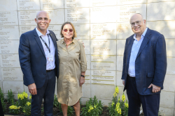 Celebrating Giving:  Marking new inscriptions on the International Plaza Donor Wall