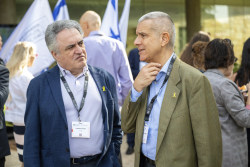 Celebrating Giving:  Marking new inscriptions on the International Plaza Donor Wall