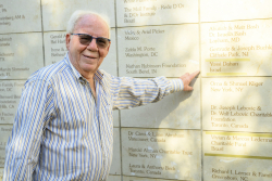 Celebrating Giving:  Marking new inscriptions on the International Plaza Donor Wall