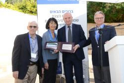 Celebrating Giving: Marking new inscriptions on the International Plaza Donor Wall