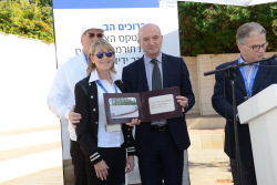 Celebrating Giving: Marking new inscriptions on the International Plaza Donor Wall