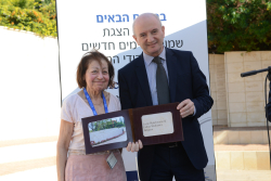 Celebrating Giving: Marking new inscriptions on the International Plaza Donor Wall