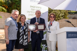 Celebrating Giving: Marking new inscriptions on the International Plaza Donor Wall