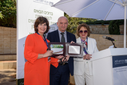 Celebrating Giving: Marking new inscriptions on the International Plaza Donor Wall