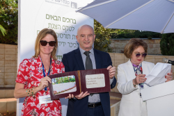 Celebrating Giving: Marking new inscriptions on the International Plaza Donor Wall